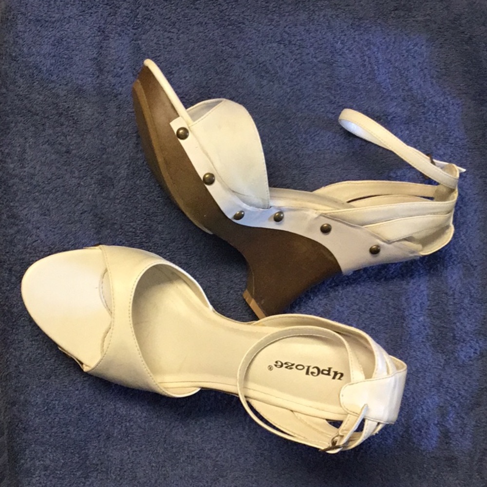 White wedge ankle strap store display heels